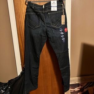 New with tags Ariat jeans. Dark wash. Lots of stretch.